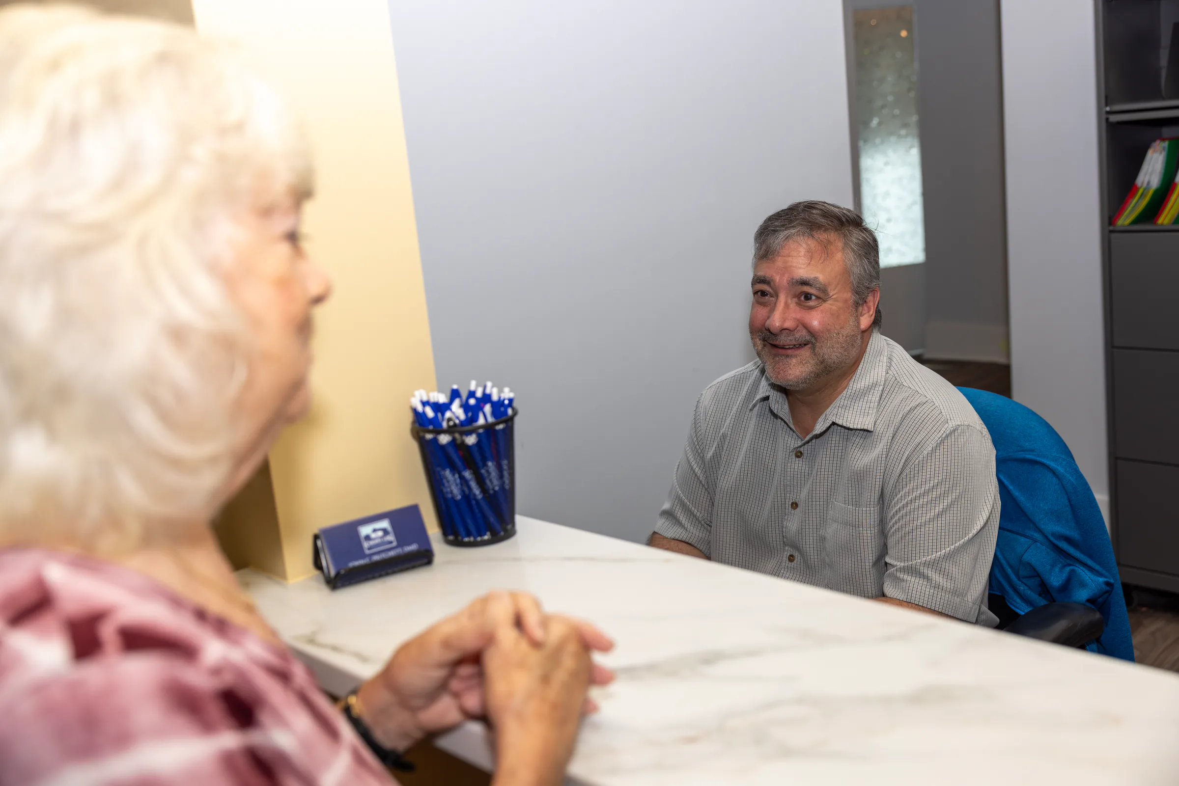 Patients meeting with the Cherry Log Oral Surgery team