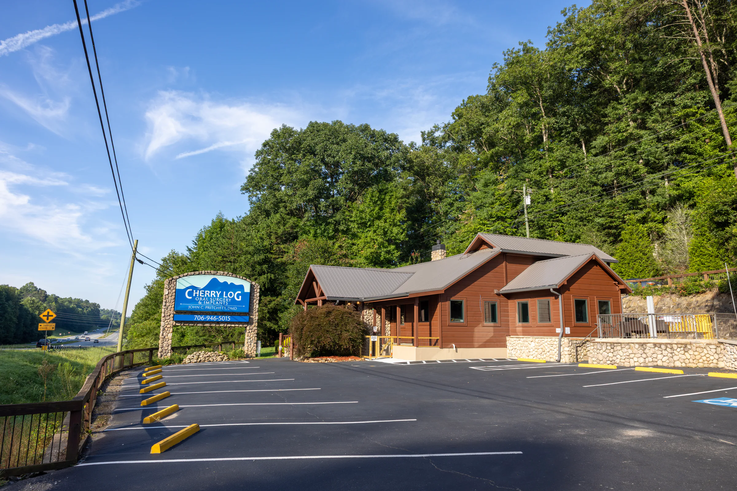 Cherry Log Oral Surgery office exterior and sign in the North Georgia mountains